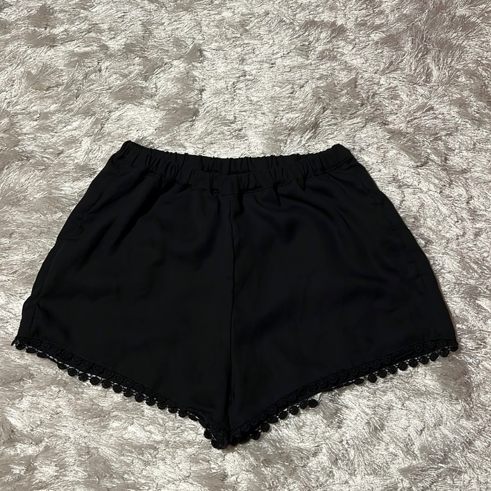 brandy melville black beach shorts with embroidery on bottom elastic waist